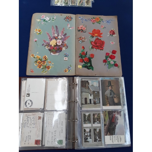 80 - A folder containing various antique and vintage postcards together with a mid 20th century scrap alb... 