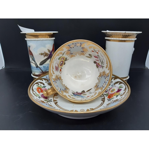 117 - Four items to include a Victorian cabinet cup and saucer with hand painted floral design with gold r... 