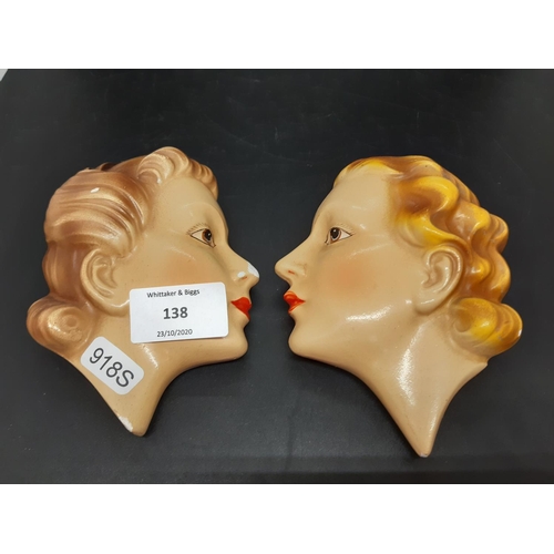 138 - A pair of Art Deco porcelain lady wall plaques - measuring approx 14cm. high (see condition report)