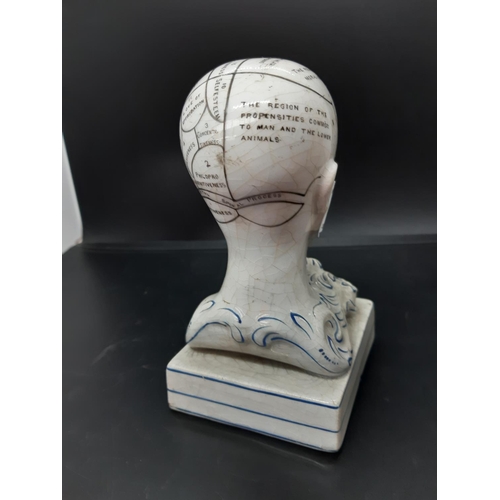 151 - A mid 19th century F. Bridges ceramic phrenology head inkwell - measuring approx. 14cm high (see con... 