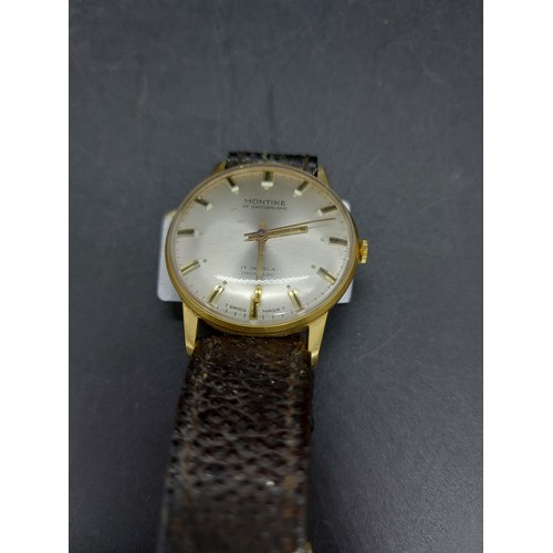 61A - A mid 20th century Montine of Switzerland 17 Jewell incabloc gents wrist watch with brown leather st... 