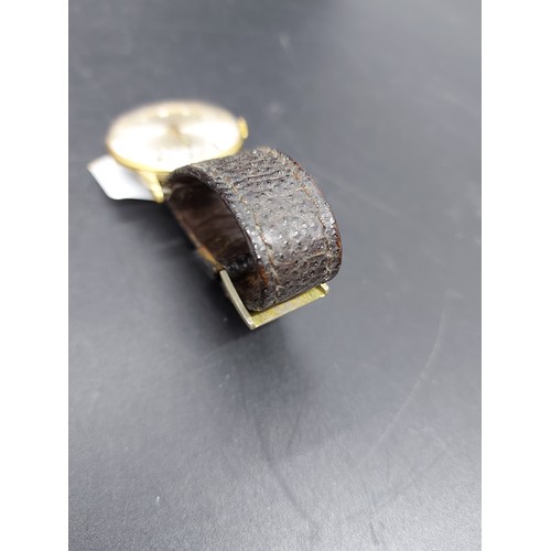 61A - A mid 20th century Montine of Switzerland 17 Jewell incabloc gents wrist watch with brown leather st... 