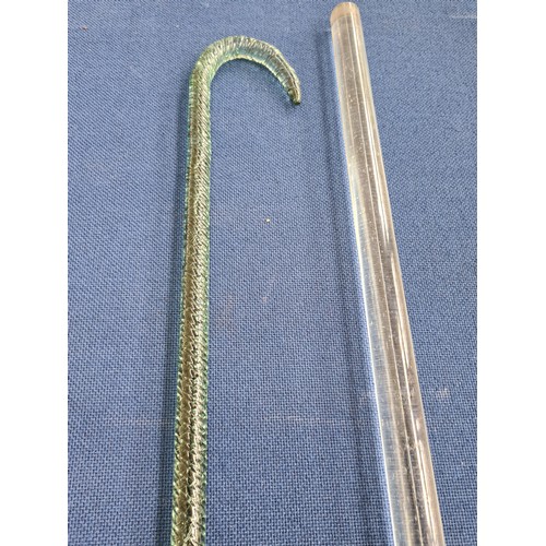 241 - Two items to include a vintage hand blown glass dandy cane and an antique glass towel rail pole