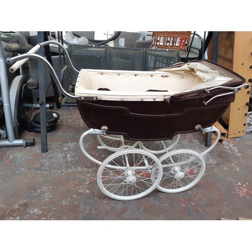 391A - A vintage burgundy Silvercross style pram - see condition report