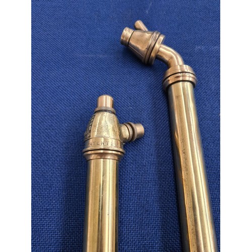 283A - Two vintage polished brass garden spray pumps