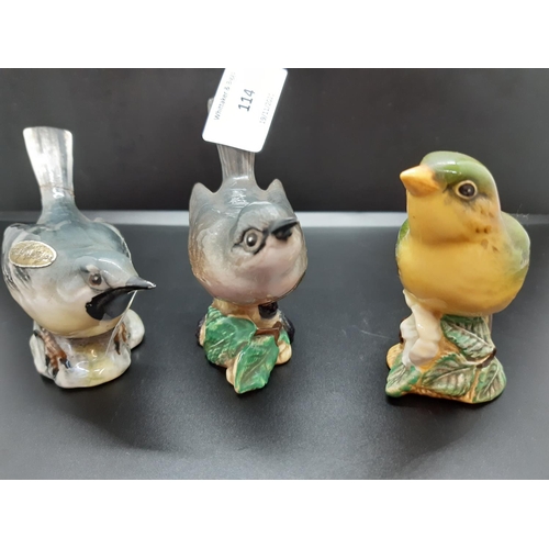 114 - Three Beswick bird figurines to include grey wagtail -  model no. 1041, whitethroat - model no. 2106... 