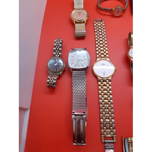 69 - A large collection of both gents and ladies wristwatches to include Lotus, Oris, Bemar, Timex, Seiko... 