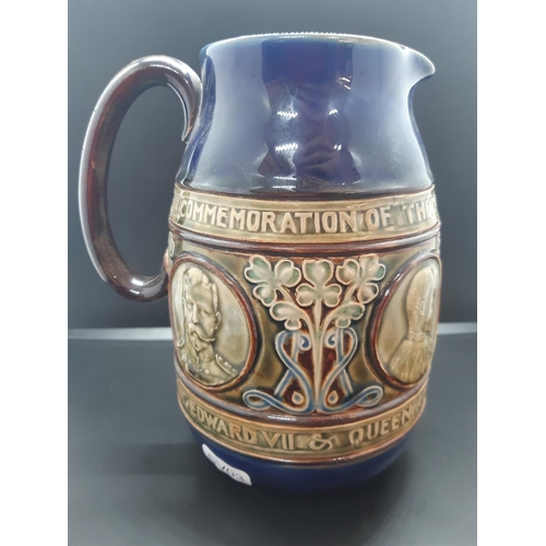 94 - A Doulton Lambeth King Edward VII & Queen Alexandra coronation water jug - measuring approx. 19cm in... 