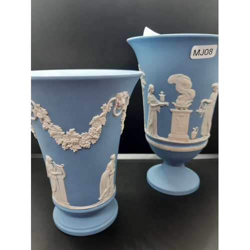 102 - Three pieces of Wedgwood Jasperware to include a green rectangular trinket box and two blue vases - ... 