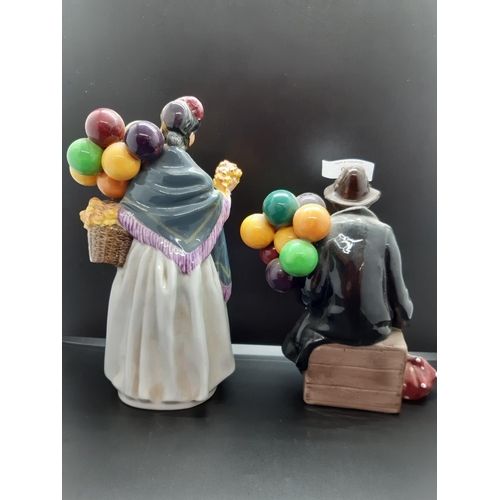 110 - Two Royal Doulton figurines to include 'The Balloon Man' - HN 1954 and 'Biddy Pennyfarthing' - HN 18... 