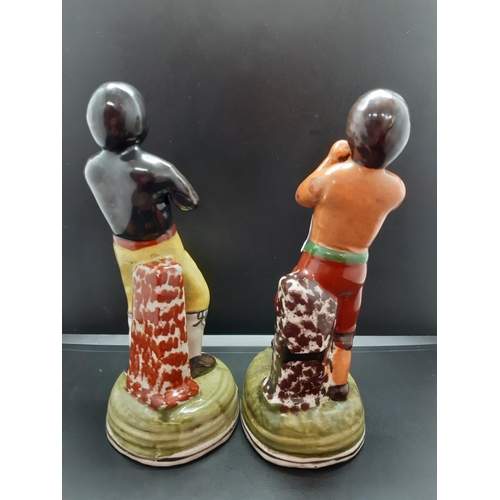 112 - Two vintage porcelain boxing figurines of Tom Cribb and Tom Molyneux (see condition report)