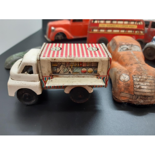 118 - A collection of 1930s and later clockwork tin plated toys to include a Mettoy Royal Mail delivery va... 