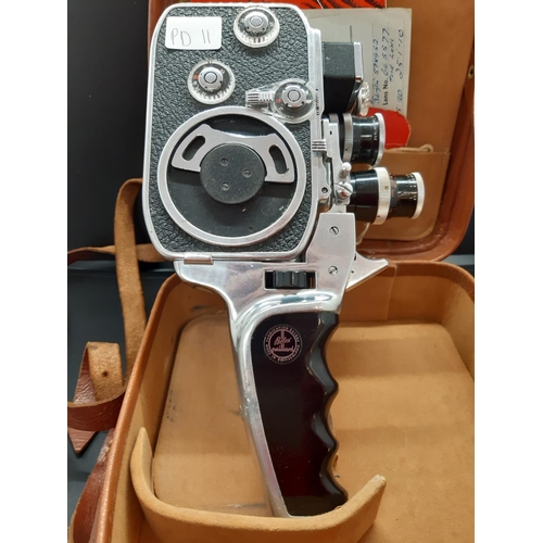 121 - A 1950s leather cased Swiss made Paillard Bolex B8 8mm cine camera with purchase receipt dated 20.2.... 