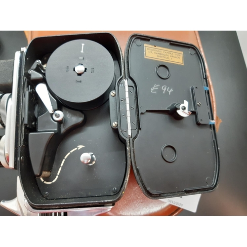 121 - A 1950s leather cased Swiss made Paillard Bolex B8 8mm cine camera with purchase receipt dated 20.2.... 