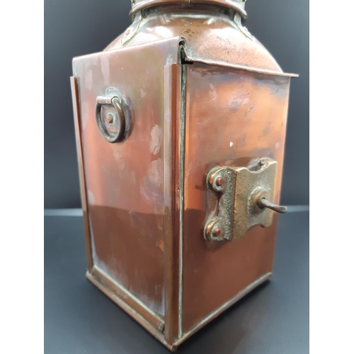 123 - An early 20th century Sherwood of Birmingham copper and brass ship's Port side oil lantern