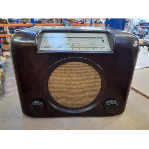 147 - Six items to include a vintage Bush Type DAC 90 bakelite radio, leather cased Evershed & Vignoles Lt... 