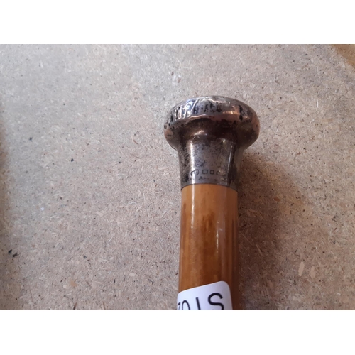 155 - A hallmarked London silver topped walking cane and a horn handled walking stick