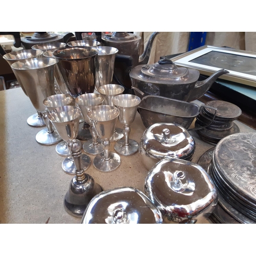 157 - A collection of assorted metalware to include EPNS four piece tea and coffee set, silver plated plac... 