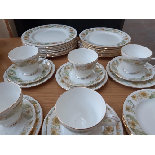 178 - A 40 piece Duchess Greensleeves pattern tea and dinner service comprising 5 trios, 8 dinner plates, ... 