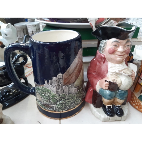 223 - Ten ceramic items to include Staffordshire Toby jugs, Royal Doulton Rip Van Winkle character jug (se... 