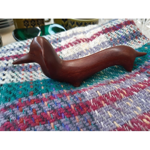 235 - Six mid/late 20th century items to include carved ironwood dachshund figurine, Murano style green gl... 