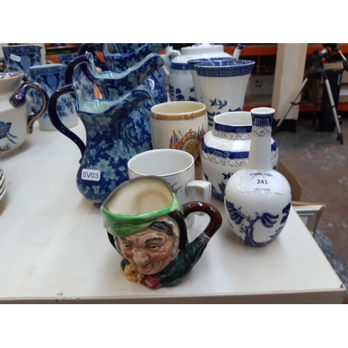 241 - 14 pieces of assorted ceramics to include a set of five blue and white Ironstone China graduating ju... 