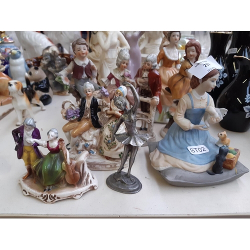 252 - 22 various figurines to include pewter ballerina, bronze effect part nude lady, classical ladies etc... 