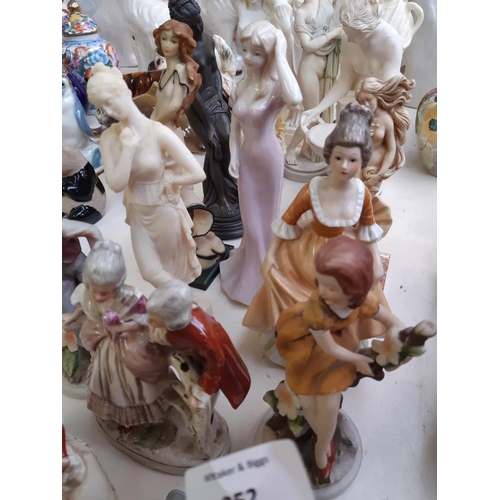 252 - 22 various figurines to include pewter ballerina, bronze effect part nude lady, classical ladies etc... 