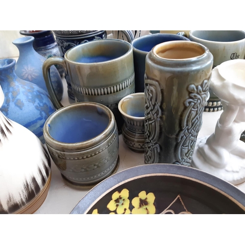 255 - 28 pieces of assorted ceramics to include Wade, Sylvac, Raymond pottery etc.