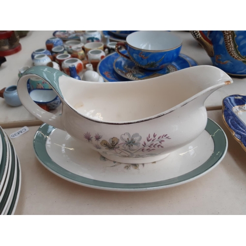 258 - 23 pieces of Midwinter Stylecraft dinnerware to include 6 side plates, 6 dinner plates, 2 tureens et... 