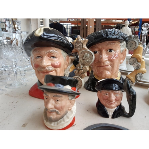 261 - Ten Royal Doulton character jugs to include The London Bobby (one small, one large), Chelsea Pension... 