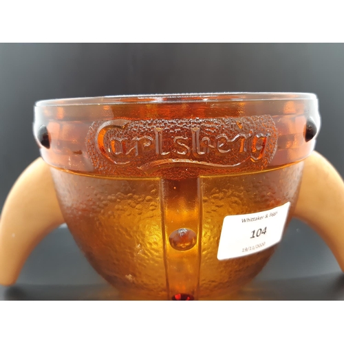 104 - A 1970s Carlsberg amber glass viking helmet drinking vessel/ice bucket