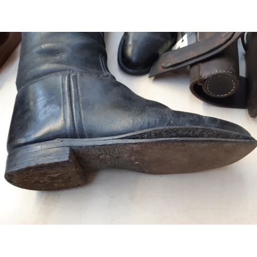 275 - A pair of vintage black leather riding boots with trees and two brown leather cases - one containing... 