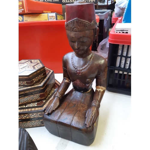 286 - Twelve pieces of assorted treenware to include African tribal style busts, African carved ebony wall... 