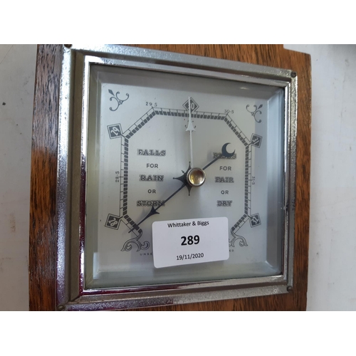 289 - A vintage oak barometer - measuring approx. 40.5cm high