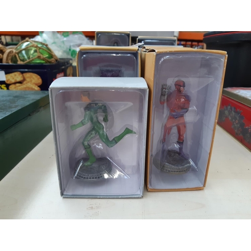 293 - Twenty boxed and loose Marvel collectors figurines to include Dr Octopus, Emma Frost etc.