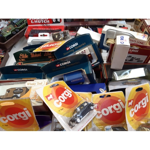 310 - A large collection of boxed diecast vehicles to include Corgi taxis, Lledo Days Gone model A Ford va... 