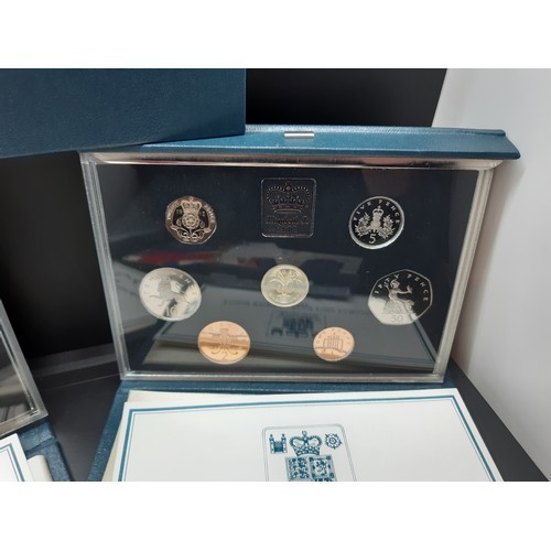 62A - Four British coin collector's sets to include 1985, 1986 and 1993 Royal Mint Proof Coin Collections,... 