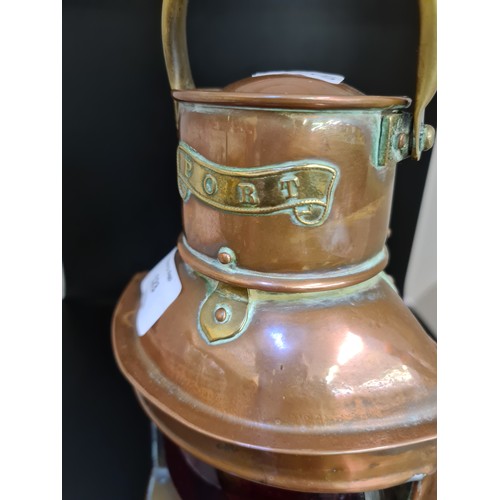 123 - An early 20th century Sherwood of Birmingham copper and brass ship's Port side oil lantern