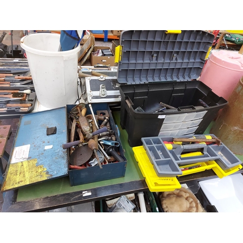 1242 - Two toolboxes, a black plastic and a blue metal, with contents to include heavy duty hand drill, woo... 
