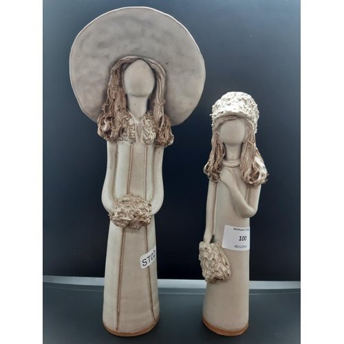 100 - Two Veronica Ballan faceless lady stoneware figurines