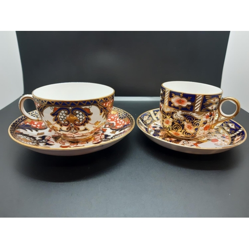 105 - Two Royal Crown Derby Imari pattern cabinet cups and saucers