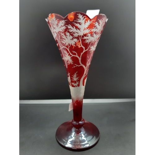 108 - A vintage Bohemian ruby glass trumpet vase - measuring approx. 17.5cm high (see condition report)