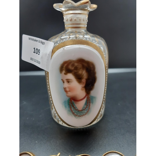 109 - A Victorian clear glass perfume bottle with porcelain portrait centre and six various Victorian styl... 