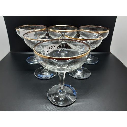 111 - A set of six Babycham drinking glasses