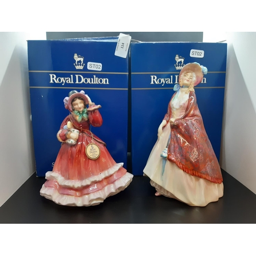 114 - Two boxed Royal Doulton figurines to include 'Christmas Time' and 'Paisley Shawl'