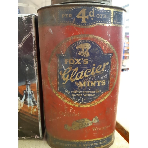 139 - A collection of vintage tins to include Fox's Glacier Mints, Cadbury's, Sir Winston Churchill biscui... 