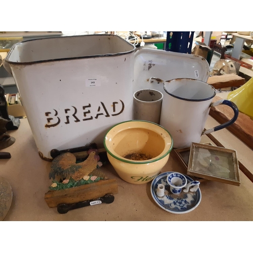 143 - A collection of mixed items to include white enamel bread bin, Victorian stoneware jelly mould, cast... 