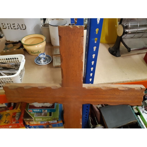 147 - A large carved wooden religious cross - measuring 122cm high