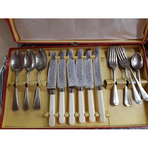 158 - A collection of assorted metalware to include loose cutlery, cased cutlery, serving trays etc.